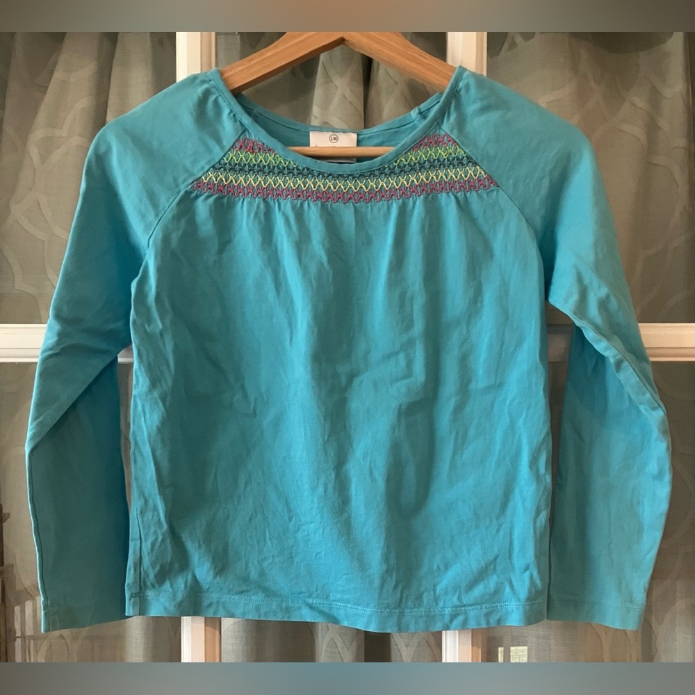 Hanna Andersson 100% cotton sz 130 8 yr lt blue top w/ smocking style embroidery
